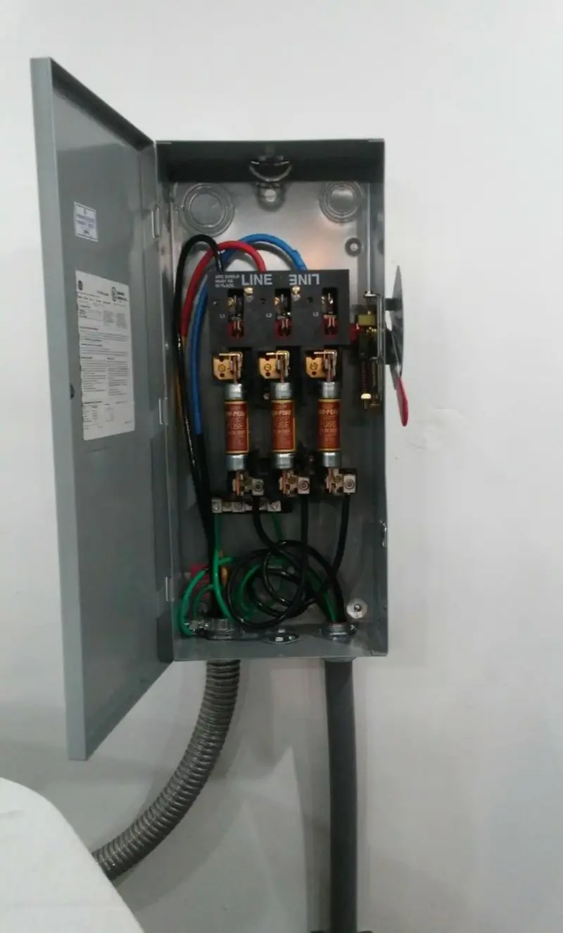 Three-phase disconnect switch installed for Smoke Detector Installation in Strathmore