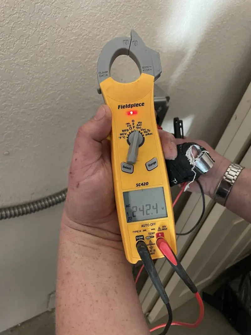 Voltage testing with clamp meter during Generator Installation in Strathmore